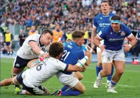  ?? ?? Low point: Varney scores Italy’s third try against the Scots
