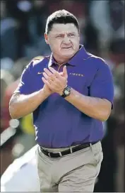 ?? KEVIN C. COX Getty Images ?? ED ORGERON has Louisiana State at the top of the college football world after beating Alabama, but his journey home to the bayou has had many twists.