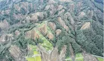  ?? PHOTO: REUTERS ?? Devastatio­n . . . Landslips caused by an earthquake are seen in Atsuma, Hokkaido, northern Japan, yesterday.