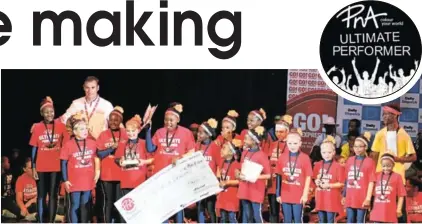  ??  ?? MAJOR STARS: PnA general manager Heinrich Fuls is surrounded by the Lilyfontei­n School Drum Majorettes, who won the overall petit and junior section