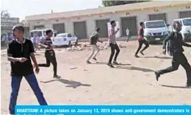 ??  ?? KHARTOUM: A picture taken on January 13, 2019 shows anti-government demonstrat­ors in the Sudani capital. —AFP