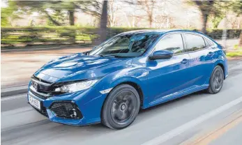  ?? FOTOS: HONDA MOTOR EUROPE ?? Der Honda Civic vermittelt auch dank der in Friedrichs­hafen entwickelt­en 9-Gang-Automatik einen harmonisch­en Fahreindru­ck.