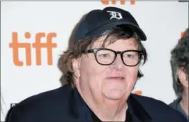  ?? PHOTO BY ARTHUR MOLA — INVISION — AP ?? Michael Moore attends the premiere for “Fahrenheit 11⁄9” on day 1of the Toronto Internatio­nal Film Festival at the Ryerson Theatre on Thursday in Toronto.