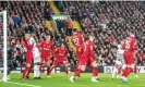  ?? SPP/Shuttersto­ck ?? Éder Militão puts Real Madrid 3-2 up at Anfield en route to a 5-2 win after Liverpool took a 2-0 lead. Photograph: Richard Callis/