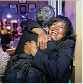  ?? RICARDO B. BRAZZIELL / AMERICAN-STATESMAN ?? Sheryl Cole (right), seeking the Democratic nomination in the House District 46 race, hugs Travis County Judge Sarah Eckhardt at Midtown Live on March 6. Cole’s public service has earned praise from leading Austin Democrats.