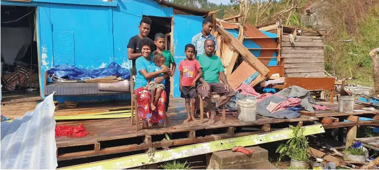  ?? Photo: Supplied ?? Alanieta Veronika with her husband Lasarusa Wainimala and their children in front of their house that was damaged by Tropical Cyclone Harold in Naqara Village in Ono, Kadavu.