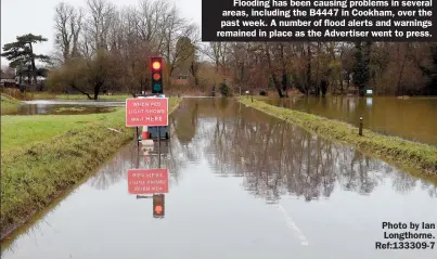  ??  ?? Flooding has been causing problems in several areas, including the B4447 in Cookham, over the past week. A number of flood alerts and warnings remained in place as the Advertiser went to press.
Photo by Ian Longthorne. Ref:133309-7