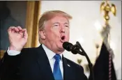  ?? DREW ANGERER / GETTY IMAGES ?? President Donald Trump disavows the Iran nuclear agreement in a speech Friday at the White House. A decision about reimposing sanctions on Tehran now goes to Congress.