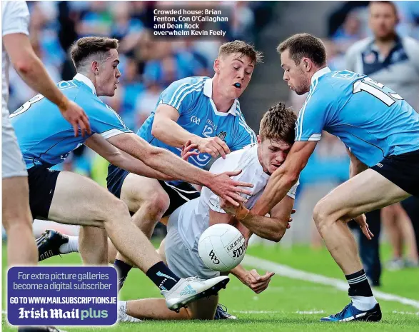  ??  ?? Crowded house: Brian Fenton, Con O’Callaghan and Dean Rock overwhelm Kevin Feely