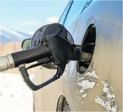  ?? GETTY IMAGES ?? The weight of a full tank in winter instead of sandbags can help with traction in snowy road conditions.