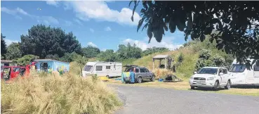  ?? PHOTO: HILARY CALVERT ?? Holiday mode . . . Campers at a southern camping ground.