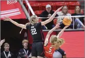  ?? ROB GRAY — THE ASSOCIATED PRESS ?? Stanford forward Cameron Brink (22) blocks the shot of Utah guard Gianna Kneepkens (5) in the first half Saturday in Salt Lake City.