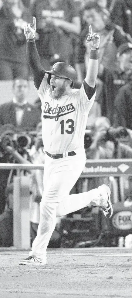  ?? Gina Ferazzi Los Angeles Times ?? MAX MUNCY reacts after hitting the first World Series walk-off home run by a Dodger since Kirk Gibson’s Game 1 blast in 1988.