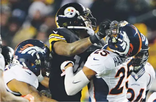  ??  ?? Steelers wide receiver Martavis Bryant roughed up Broncos cornerback Chris Harris when their teams met for the first time this season, Dec. 20 in Pittsburgh. The rematch comes Sunday, a playoff game in Denver with a berth in the AFC championsh­ip game...