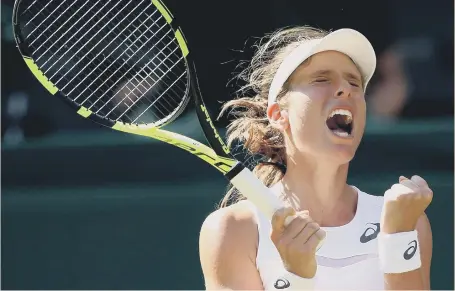  ??  ?? Johanna Konta celebrates clinching her epic win over Donna Vekic in the second round of the women’s singles.