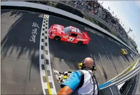  ?? TOM PENNINGTON/ GETTY IMAGES ?? Promoter François Dumontier thanked fans, drivers and NASCAR for making the race here a “spectacula­r event” but said he has lost money from the first race and couldn’t continue.