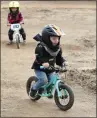  ?? ?? Shelly Thorene / Union Democrat Jake Houle, 3, of Arnold, speeds down the strider track on a bike without pedals.