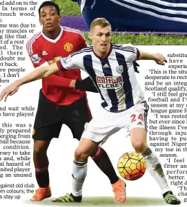 ??  ?? SURVIVOR: Fletcher against old club Man United in West Brom colours; the Scot helped the Baggies stay up
