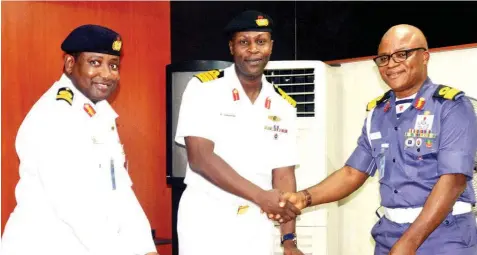  ??  ?? New Director of Naval Informatio­n, Commodore Ayo Olugbode (left); Former Acting Director, Captain Suleiman Dahun and Navy Provost, Commodore Clement Egbinta during the handing over ceremony to the new director in Abuja …yesterday