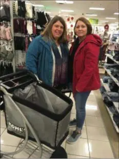  ?? KATHLEEN CAREY - DIGITAL FIRST MEDIA ?? Claudette Mapes and Jane Master were out early as they hit Kohl’s at 3 a.m. to take advantage of Black Friday deals.