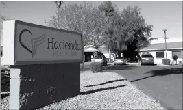  ?? ASSOCIATED PRESS ?? THIS JAN. 4 PHOTO SHOWS HACIENDA HEALTHCARE IN PHOENIX. The revelation that a Phoenix woman in a vegetative state recently gave birth has prompted Hacienda HealthCare CEO Bill Timmons to resign, putting a spotlight on the safety of long-term care settings for patients who are severely disabled or incapacita­ted.