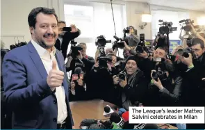  ??  ?? The League’s leader Matteo Salvini celebrates in Milan