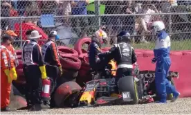  ?? Photograph: F1 ?? Max Verstappen climbs out of his car after the crash caused by Lewis Hamilton at Silverston­e.