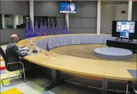  ?? Yves Herman Pool Photo ?? EUROPEAN COUNCIL President Charles Michel prepares for the Group of 20 meeting Saturday. The U. S. formally exited the Paris climate accord on Nov. 4.