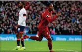  ??  ?? UNSUNG HERO: Wijnaldum celebrates his goal