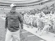  ?? Jason Fochtman ?? The Woodlands head coach Mark Schmid yells in celebratio­n after the Highlander­s knocked off Allen 36-28 in a Class 6A Division I state semifinal game at Darrell K Royal-Texas Memorial Stadium on Dec. 10, 2016, in Austin.