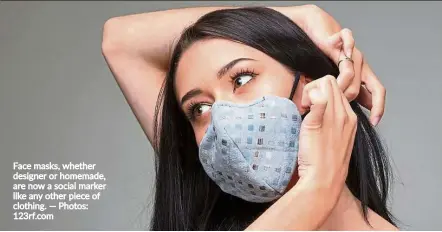  ?? — Photos: 123rf.com ?? Face masks, whether designer or homemade, are now a social marker like any other piece of clothing.