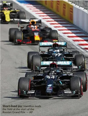  ?? — AP ?? Short-lived joy: Hamilton leads the field at the start of the Russian Grand Prix.