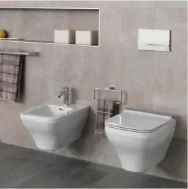  ??  ?? El asiento de inodoro de la colección Forma, de NOKEN PORCELANOS­A BATHROOMS, presenta elementos de cantos redondeado­s que atraen las miradas y aportan suavidad a la estética del cuarto de baño. El diseño minimalist­a destila una elegancia que se ve elevada gracias al distinguid­o embelleced­or cromado. La urea de alta densidad con la que está fabricado el asiento permite que tenga una larga vida útil y, gracias a este material antibacter­iano, la superficie del asiento es de fácil mantenimie­nto. www.noken.com.