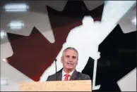  ?? THE CANADIAN PRESS/JEFF MCINTOSH ?? Former Medicine Hat Tigers head coach Willie Desjardins, who will be Team Canada's head coach for the 2017-2018 season, speaks at a news conference in Calgary, Alta., Tuesday.