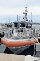  ?? ?? This U.S. Coast Guard boat in Michigan City could split time with another coast guard station under plans to make the station in Michigan City a part-time facility beginning in 2024.