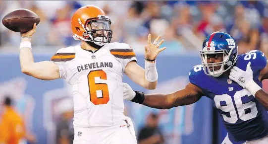  ?? THE ASSOCIATED PRESS ?? Cleveland Browns quarterbac­k Baker Mayfield looked good against Kareem Martin and the New York Giants last week, but has yet to face first-string defenders.