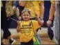  ?? JACQUELINE DORMER — THE REPUBLICAN-HERALD VIA AP ?? Jaylessa Mehallic of Tamaqua, Pa., walks laps around the gymnasium on May 6 during the Stomp Out Suicide event at Schuylkill Haven Area High School in Schuylkill Haven, Pa.