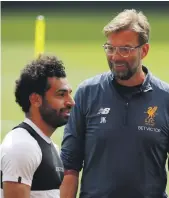  ?? Reuters ?? Liverpool manager Jurgen Klopp, right, said Mohamed Salah is now fully fit again