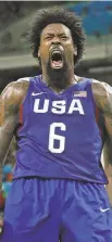  ?? CHARLIE NEIBERGALL/ASSOCIATED PRESS ?? DeAndre Jordan roars after a dunk during the semifinal win Friday. Jordan brought down 16 rebounds to go along with 9 points and 4 blocks.