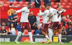  ?? Reuters ?? Aston Villa’s Kortney Hause celebrates with Danny Ings after the successful outing against Manchester United.