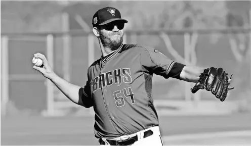  ?? MATT YORK, AP ?? “I knew I didn’t want to do this anymore, so I stepped away and did what I wanted to do,” says Diamondbac­ks reliever Tom Wilhelmsen, who spent five years away from baseball before making his big-league debut in 2011.