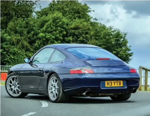  ??  ?? The key to making a 996 C2 look good? Remove the rear badge and rear wiper and lower the suspension. That’s it, really. James has also fitted OZ Alleggerit­a wheels