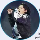  ?? PHOTOGRAPH COURTESY OF THE KOREA HERALD ?? JUNGKOOK performs at FIFA World Cup.