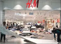  ?? Picture: THOBILE MATHONSI/ANA ?? VANDALISED: The H&M clothing store in Menlyn mall was trashed on Saturday by EFF supporters to protest against a hoodie slogan.