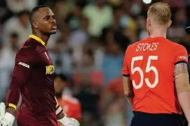  ??  ?? Cutting sledge: Samuels gives Stokes a verbal volley