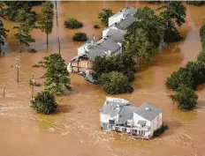  ?? Brett Coomer / Staff photograph­er ?? A study released Thursday warns that severe weather events may strike Texas more often. It led officials to reconsider rainfall totals defining 100-year weather events, which have a 1 percent chance of occurring in any given year.