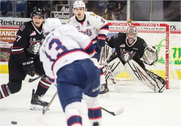  ?? BRANDON HARDER ?? The Regina Pats Sergei Alkhimov fires a shot at Red Deer Rebels netminder Byron Fancy during Saturday’s game at the Brandt Centre. The Rebels won handily, 9-4.