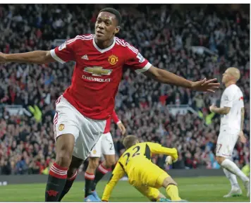  ?? PICTURE:ACTION IMAGES VIA REUTERS / CARL RECINE ?? Anthony Martial celebrates after scoring the third goal for Manchester United.