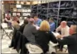  ?? RECORD PHOTO ?? North Greenbush town Supervisor Lou Desso, top left, observes as absentee ballots from the town are counted at the Rensselaer County Board of Elections.