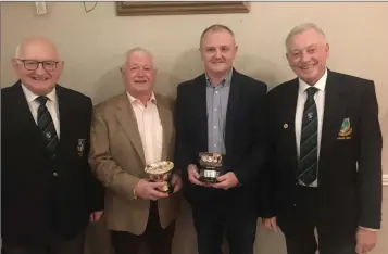  ??  ?? President Jim Murray with Club Scotch Foursomes winners, father and son Pat and Derek Byrne, alongside club captain Martin Hennessy.